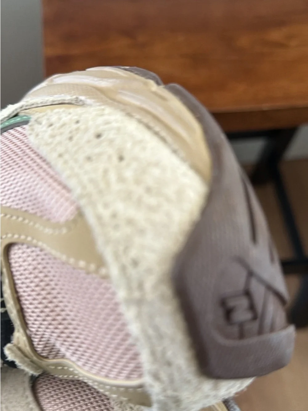 New Balance Beige and Black Accent Sneakers